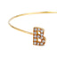 Bracciale contrarié in oro rosa con iniziale e cuore in diamanti - Herzel Gioielli